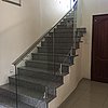 Frameless Glass Floor Mount on stairs.JPG